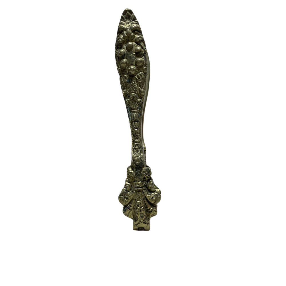 Vintage Solid Brass Nutcracker Floral Featured