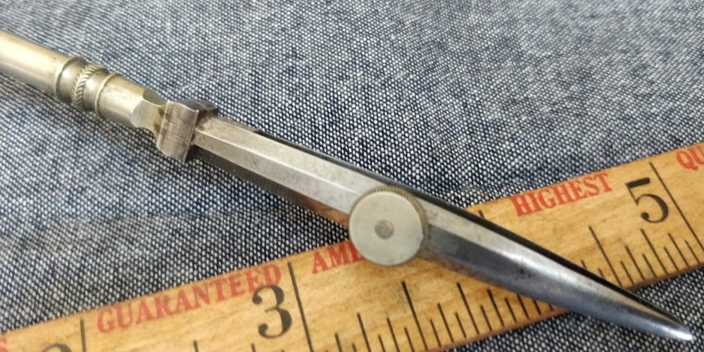 Vintage drafting Pen with white handle Bone?