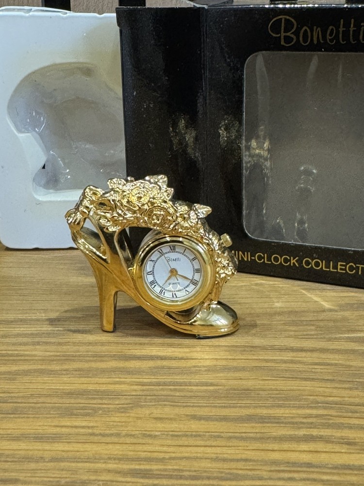 Bonetti Clock Collection comprising 7 boxed gold finished analogue mini-clocks