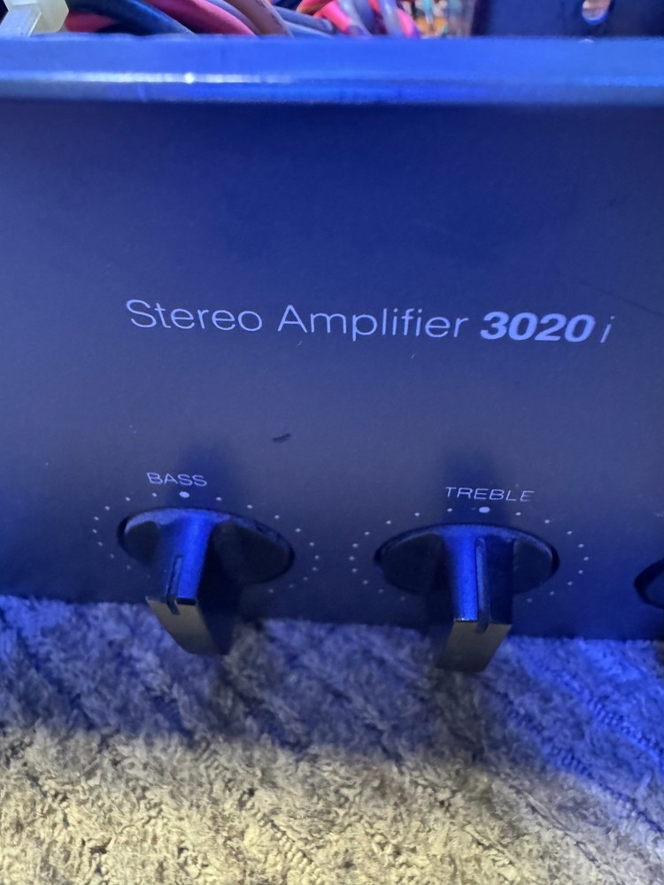 Vintage NAD 3020I amplifier power switch.