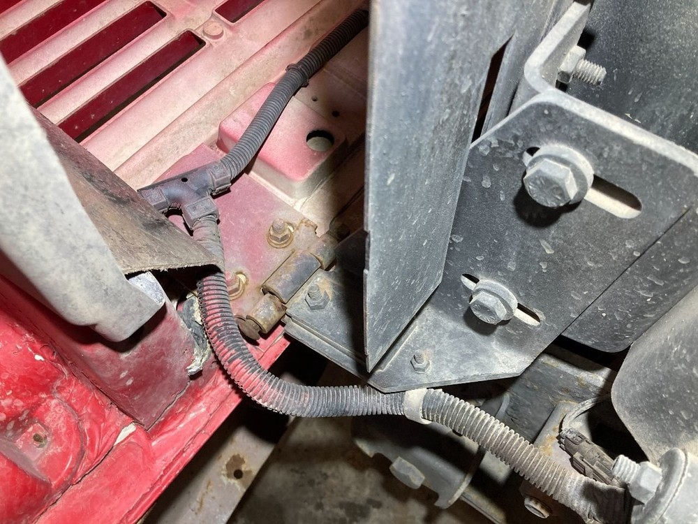 International 4700 Left/Driver Hood Hinge - Used