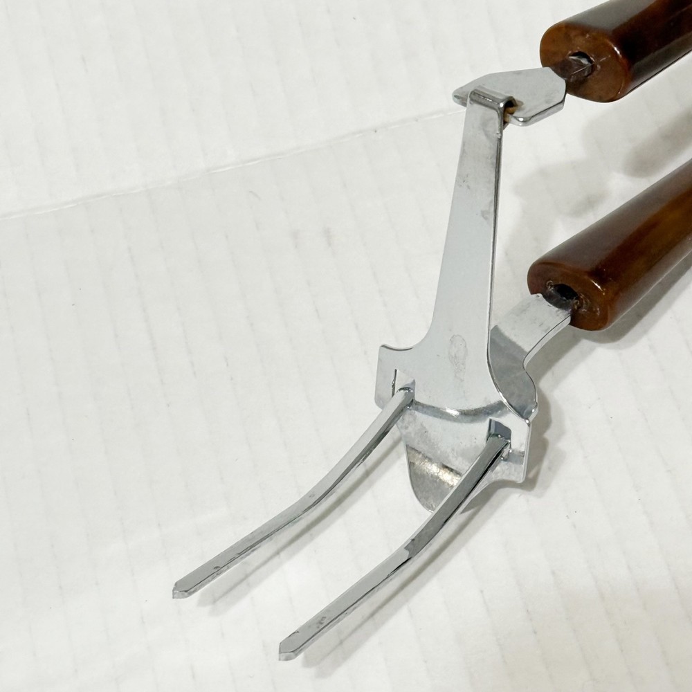 Vtg Two Prong Meat Server Tool with Bakelite Tortoiseshell Handles Springloaded