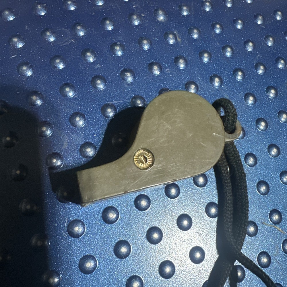 Vintage WW2 U.S. Navy 1944 dated OD Plastic Whistle with Black Lanyard Works