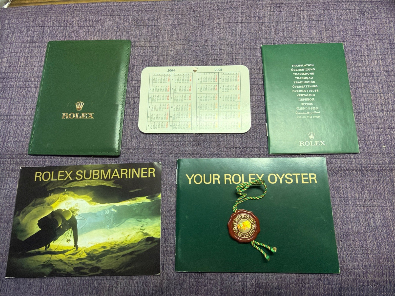 Rolex 2004 Submariner Accessories Set.Booklets;paper hold;Tag;calendar English‼️