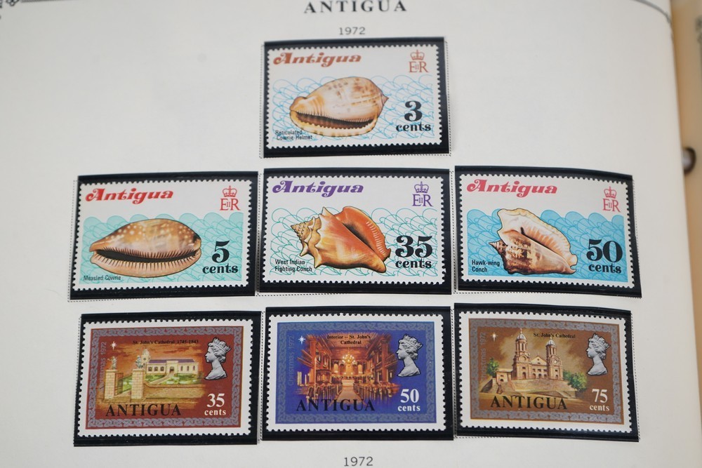 WORLDWIDE A-L 1970s COLLECTION OF 875+ STAMPS MINT & USED STORED IN SCOTT ALBUM