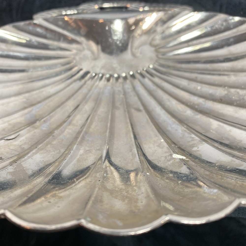 Scallopped edge silver colored dish