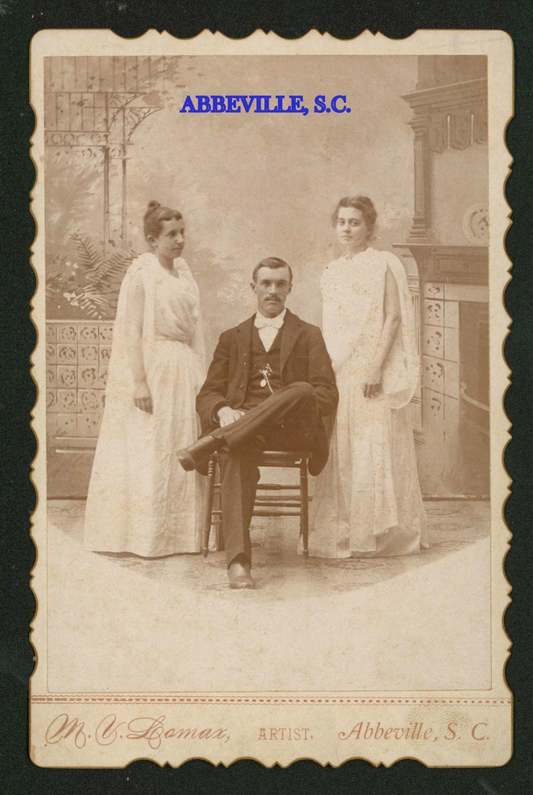 Studio pose of Father and two Daugthers,  .M.V.  LOMAX  ~  ABBEVILLE ,S.C.