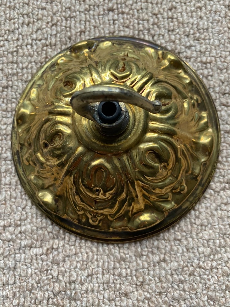 old  brass ceiling rose with hook