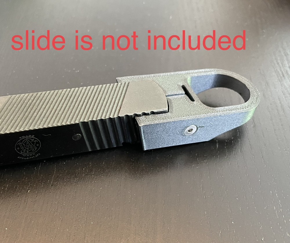 Smith & Wesson model 41 .22 finger loop charger, slide racker.