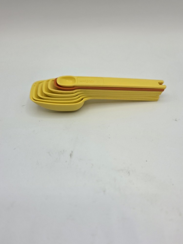 Vintage Tupperware Yellow Measuring Spoon Set