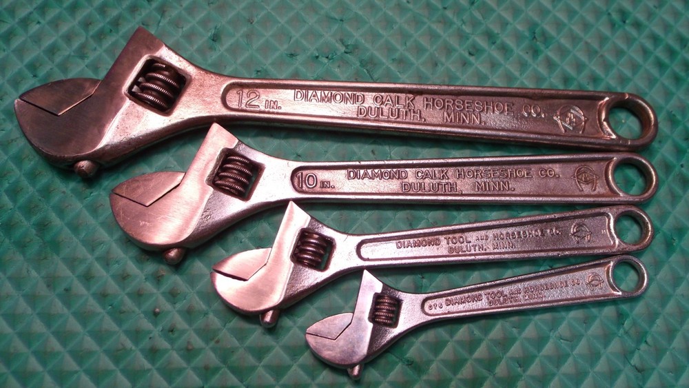 4 PCS. "DIAMALLOY" U.S.A. ADJUSTABLE END WRENCHES