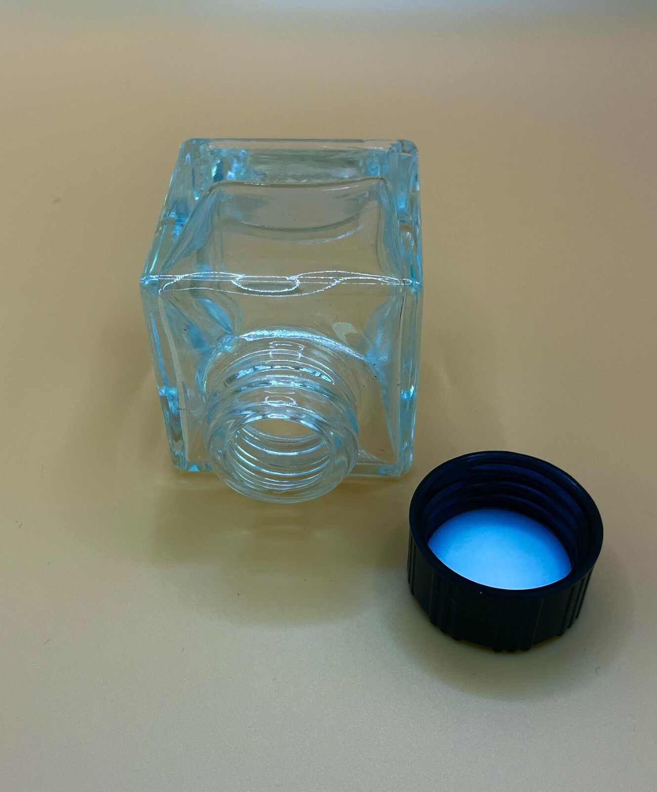 New, empty 50 ml glass square jars with lids, box of 8. Any quantity available