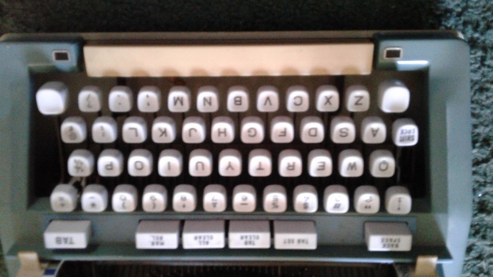 Hermes Typewriter with case and key