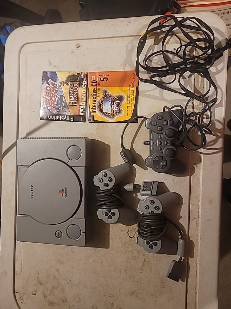 Playstation 1 Console w Controllers, Guillemot Negcon Shock Controller, Demo CDs