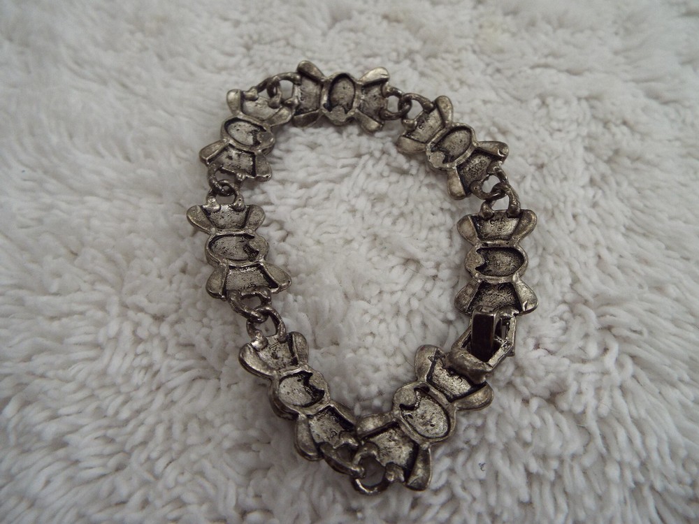 Silvertone Bow Brown Bead Link Bracelet