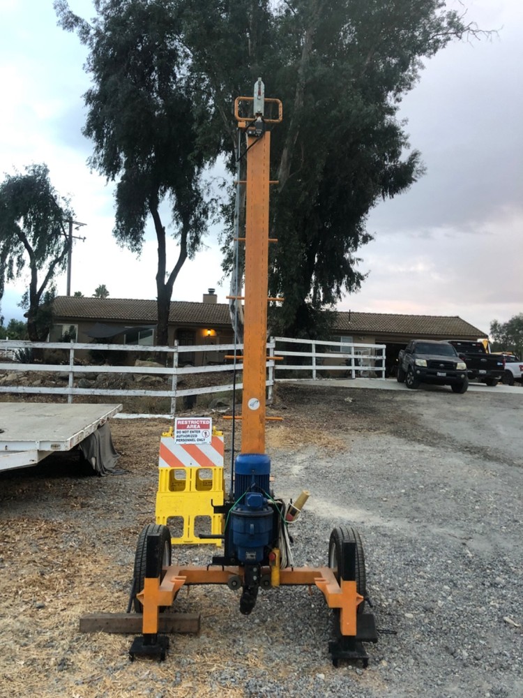 Auger drilling machine built on trailer