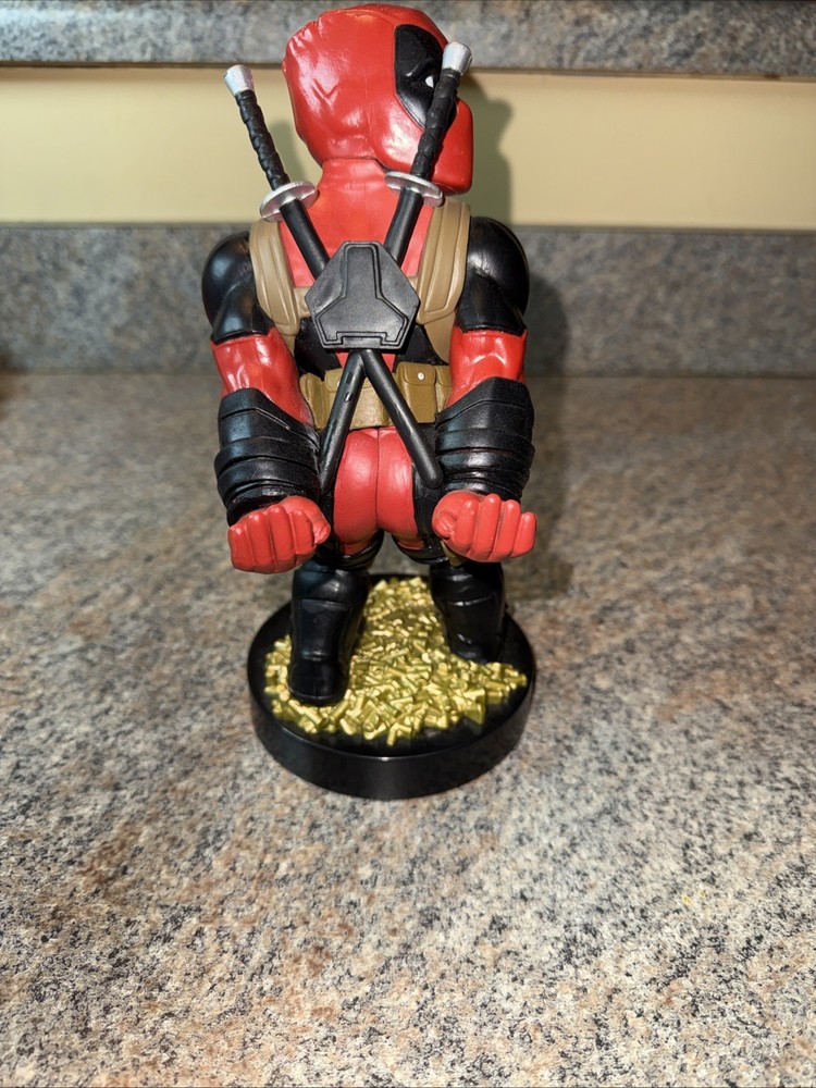 Deadpool controller/phone holder. Marvel Cableguys. Good shape. About 9 " High.