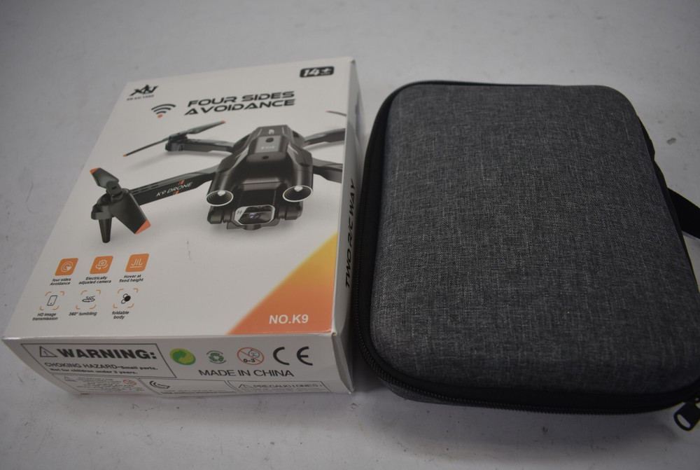 Xin Kai Yang K9 Drone Four Side Avoidance Camera Drone RC With Carrying Case