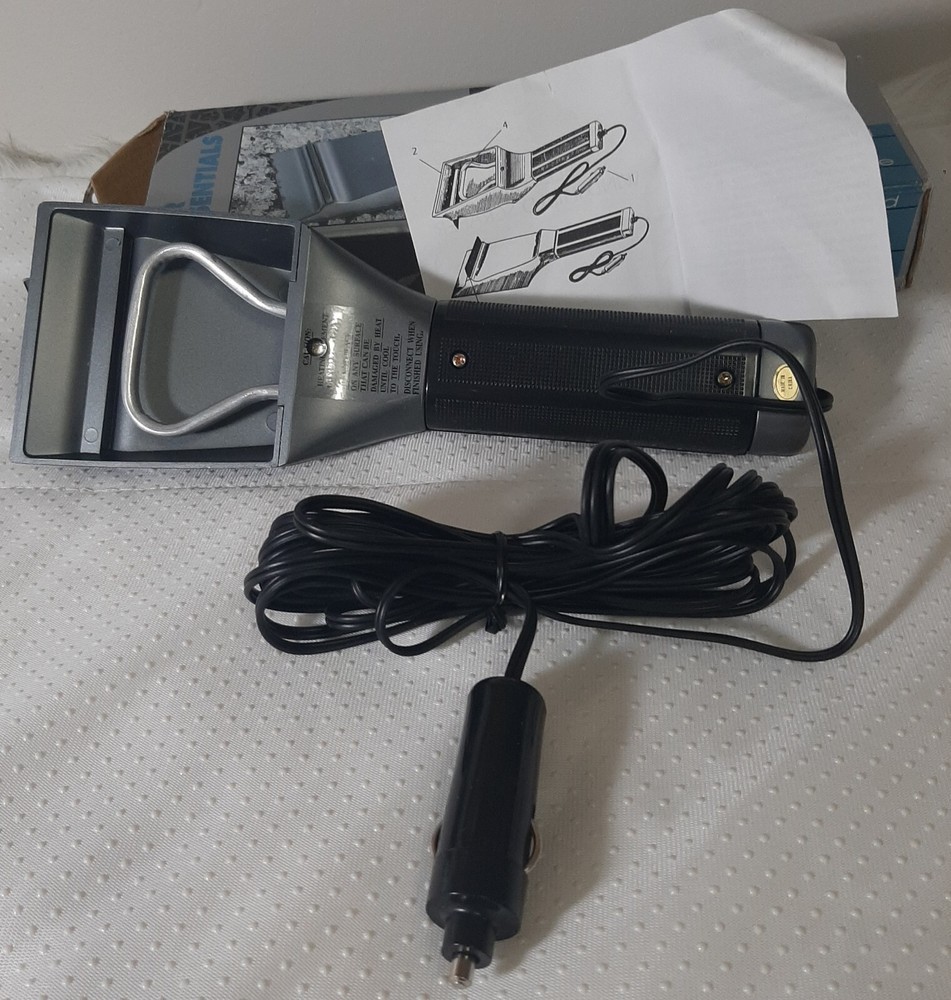 ELECTRIC WINDSHIELD SCRAPER Star case.  Tested.