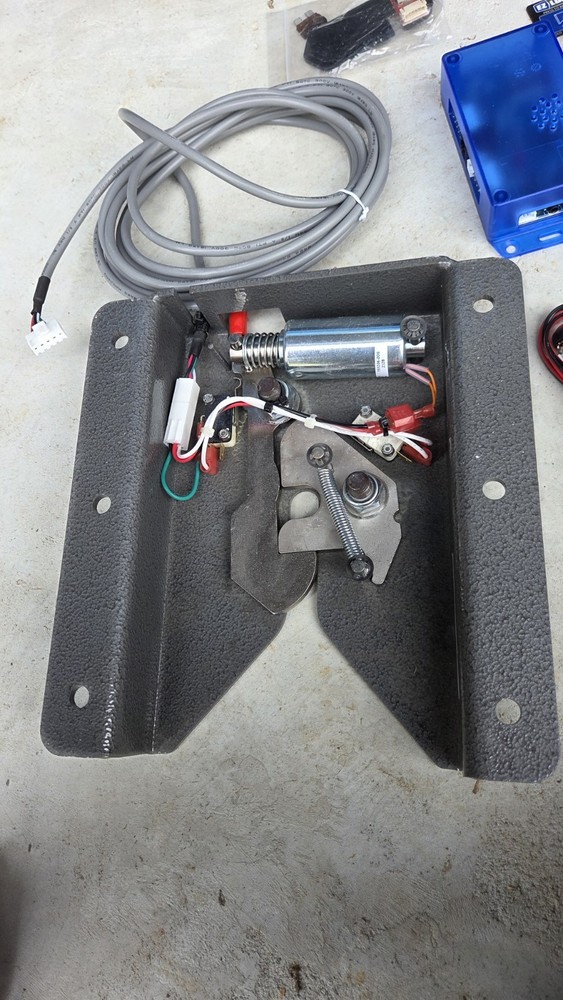 EZ Lock wheelchair lock down device like Qstraint Qlock