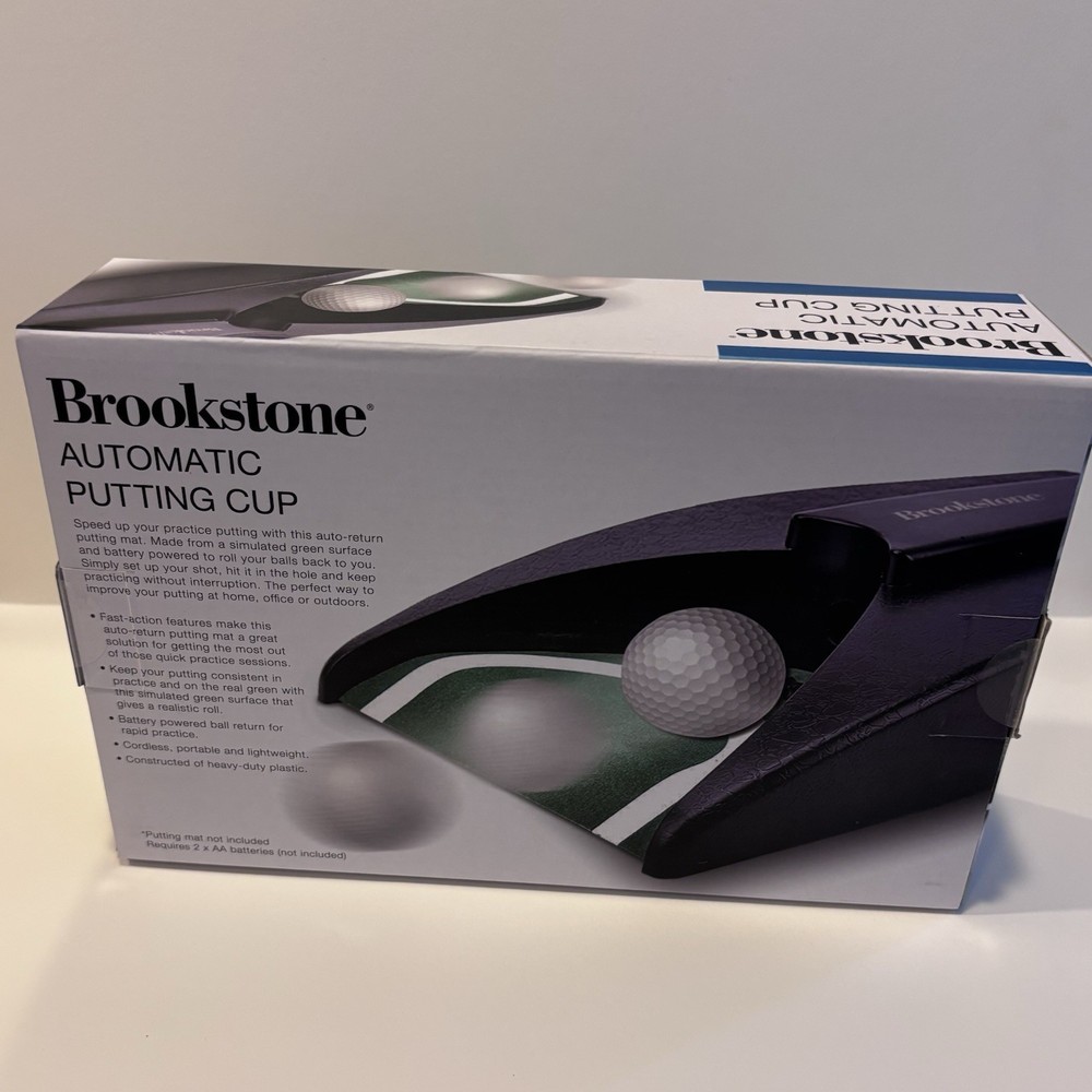 NIP / SEALED Brookstone Automatic Putting Cup Cordless Portable