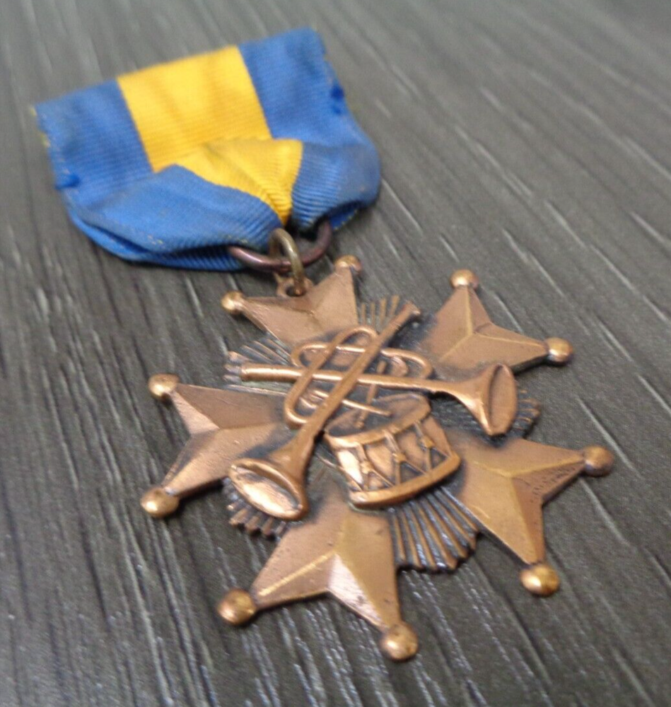 Vintage Bugle Roster Medal DISTINGUISHED