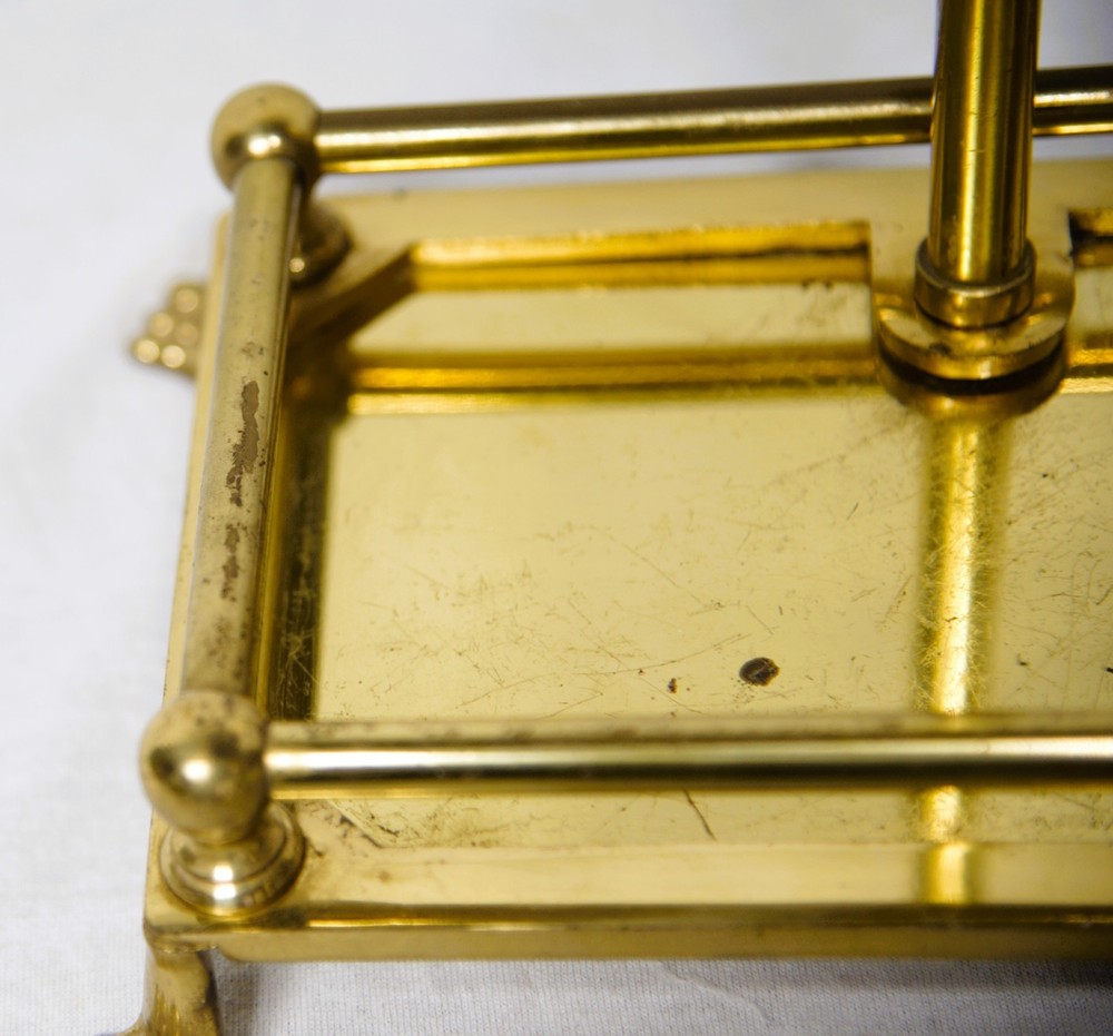 Four-piece brass fireplace poker set