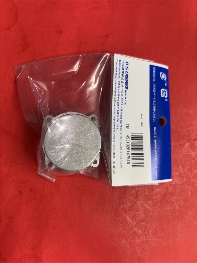 OS AX 65 REAR COVER NIP