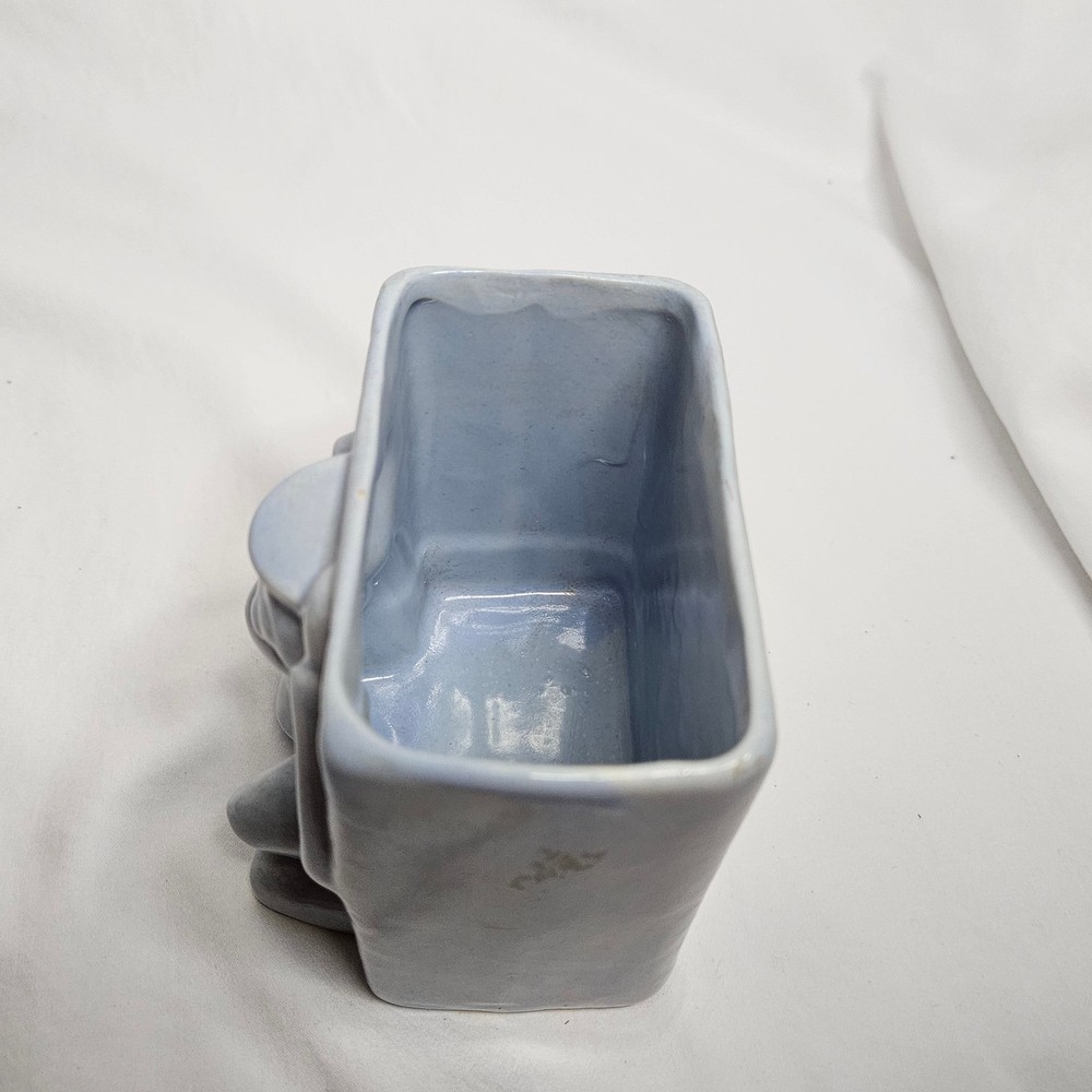 Vintage Niloak Circus Monkey planter, light blue, 4" tall