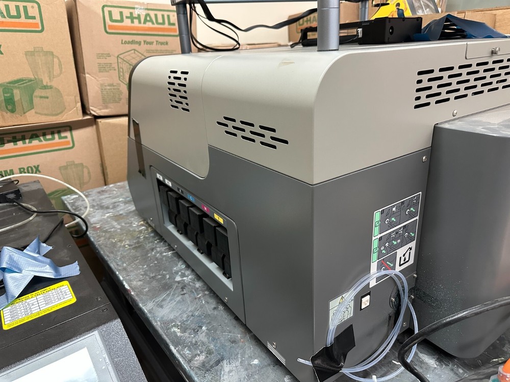 Ricoh RI-1000 DTG printer.