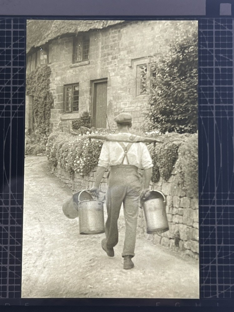 Magic Lantern Slide man carrying milk pails