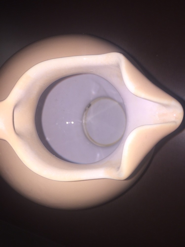 Pottery Footed Ball Tilt Ice Lip Pitcher