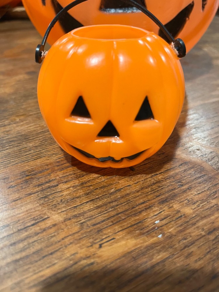 Two jack o lantern pumkins