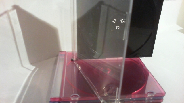 Plastic cd , dvd Cases ( mixed colors )