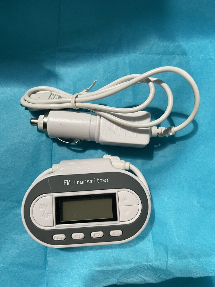 In Car FM Transmitter w Charger Model SP2202