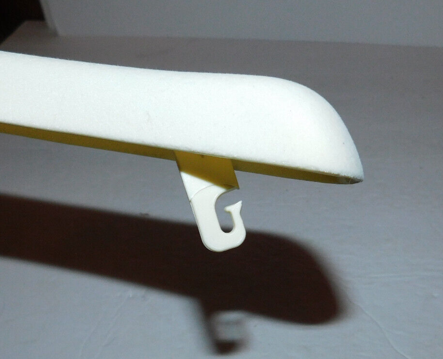 NICE IVORY COLOR PLASTIC ESCADA CLOTHES HANGER