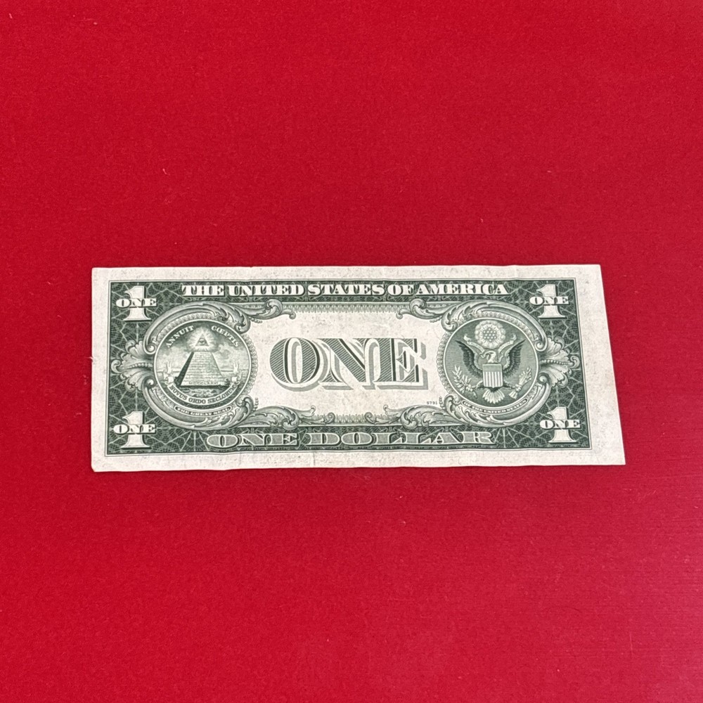 $1 ERROR 1935-E (SILVER CERTIFICATE) MISCUT ERROR - Misaligned print