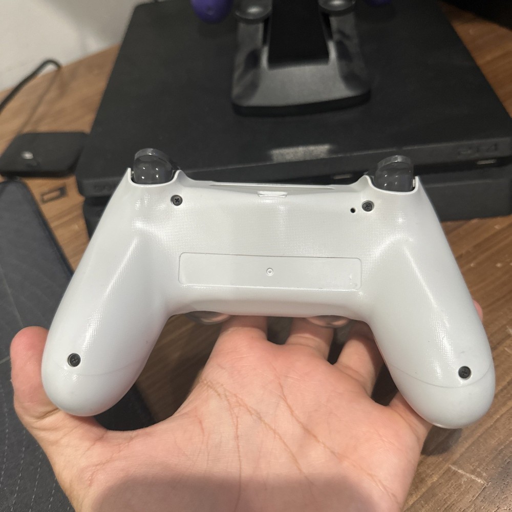 Playstation 4 Slim 2TB SSD + 4 Controllers & Charging Dock