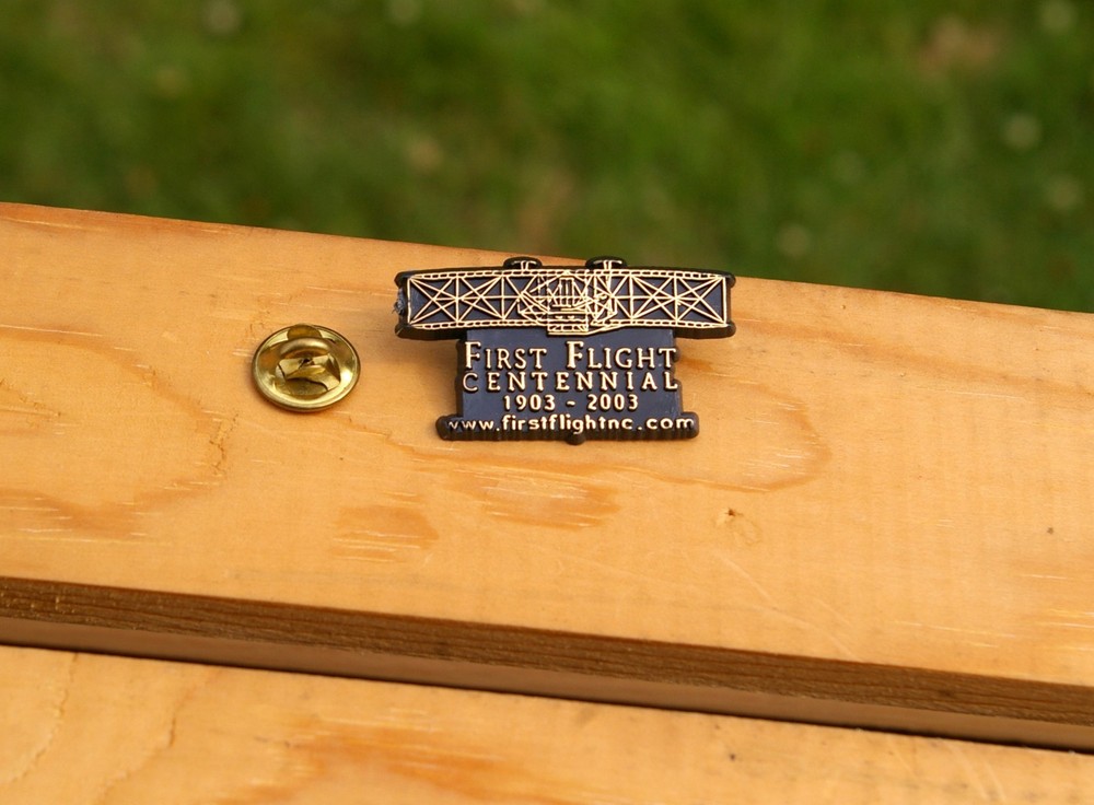 First Flight Centennial 1903-2003 Plastic Biplane Lapel Pin Pinback
