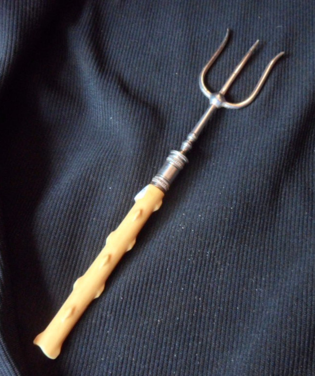 Antique Silver Plated three pronged, bread fork.
