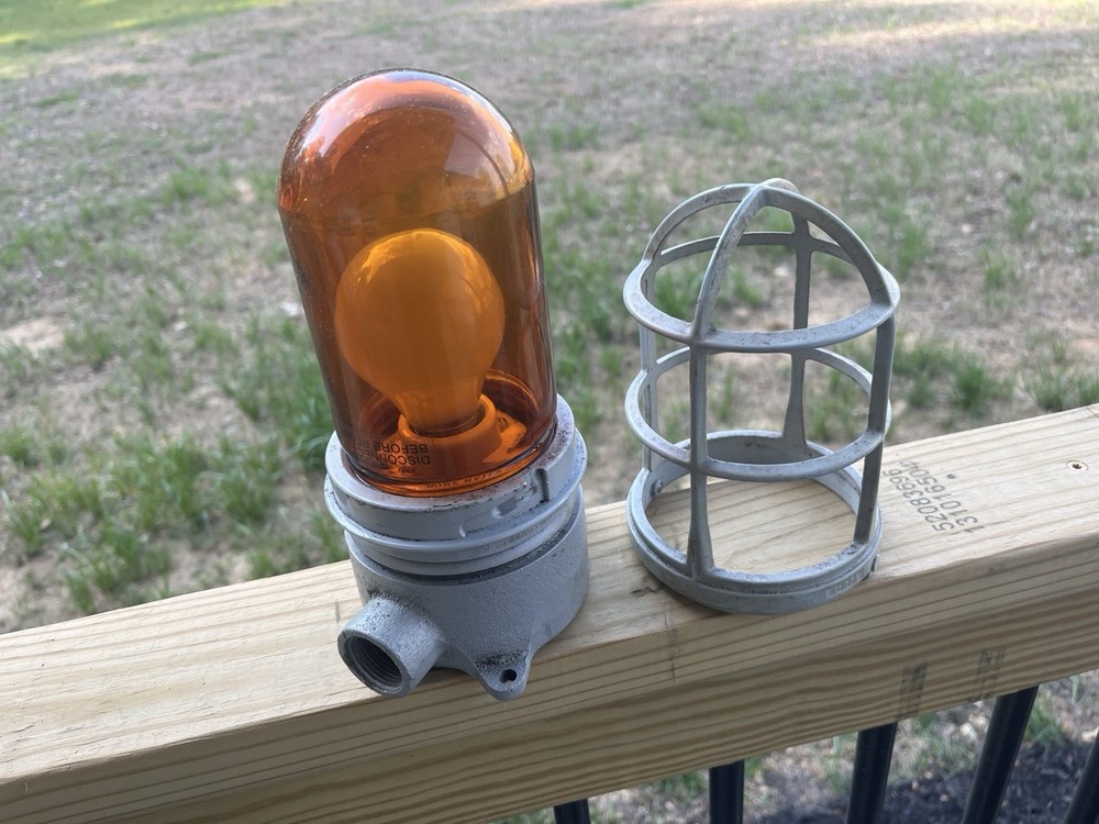 APPLETON FORM 100 EXPLOSION PROOF LIGHT W/ CAGE And GLOBE AMBER COLOR. Untested
