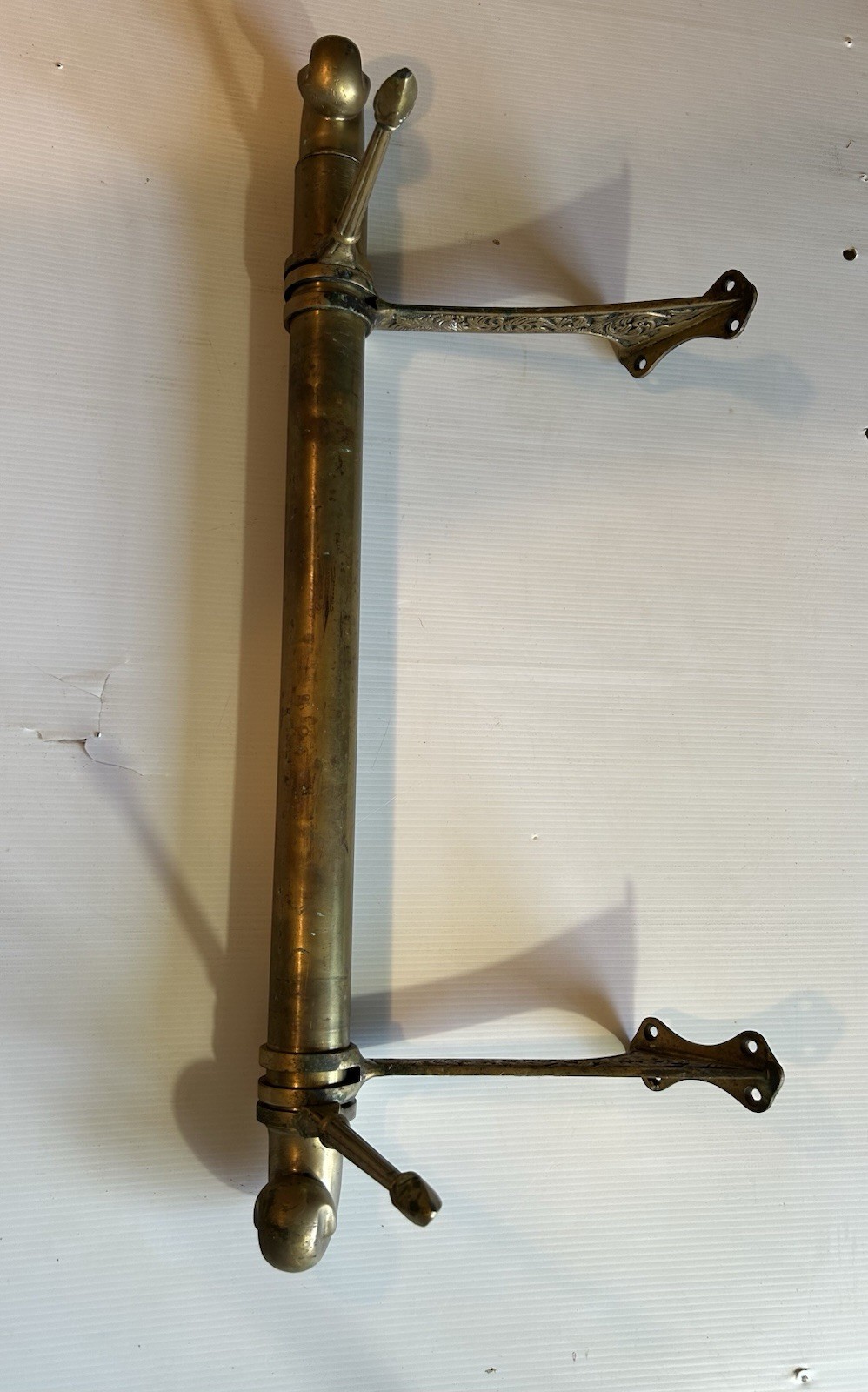 ANTIQUE BRASS BAR END RAIL AND FANCY DECORATED RAIL HANGERS