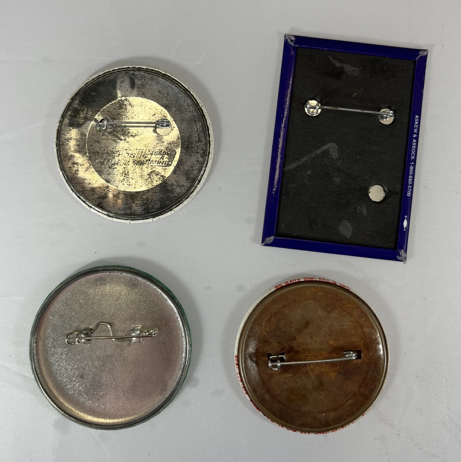 LOT OF 4 PINBACKS BUTTONS ANTI-NUCLEAR UTILITY RATES EUROMISSILE TEST BAN TREATY