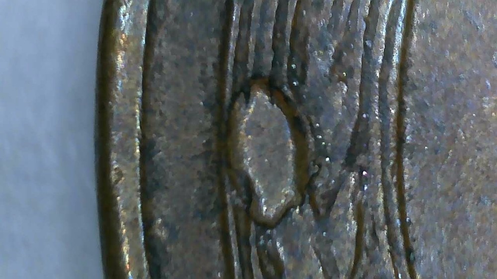 1958 P lincoln penny with 2 cuds errors on reverse wheats.