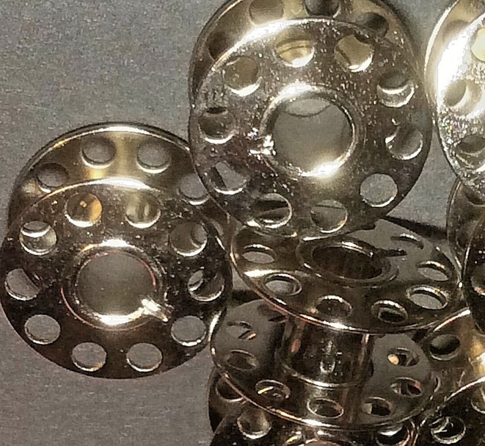 Sewing Machine Bobbin Case Plus 10 Bobbins That Fit Several Brother Models