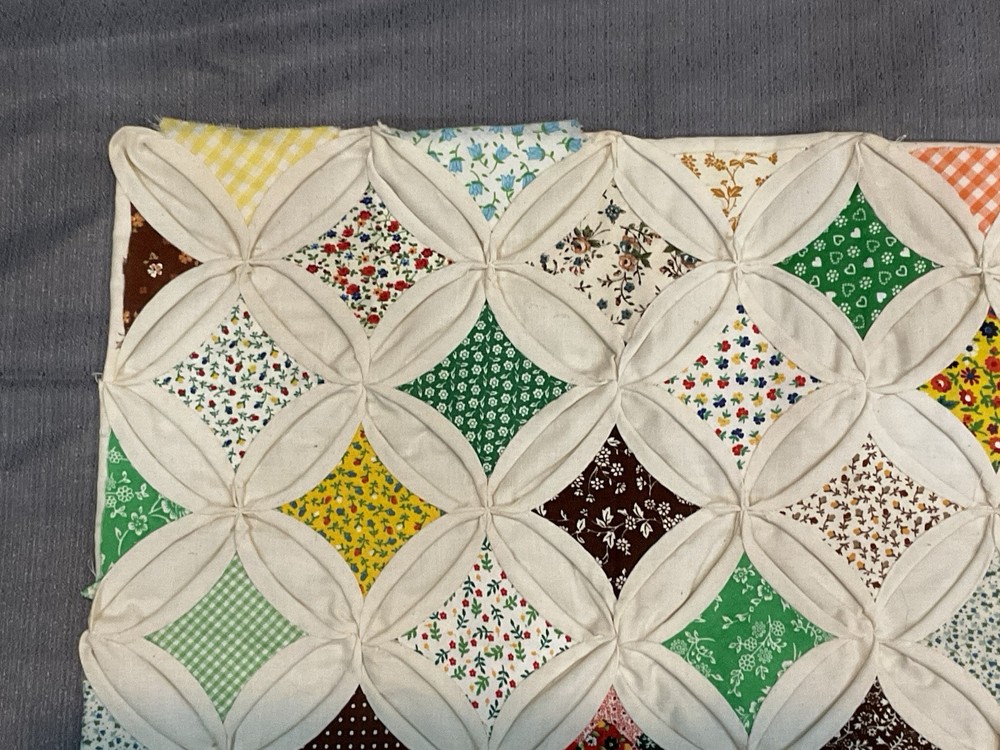 Cathedral windows wall quilt
