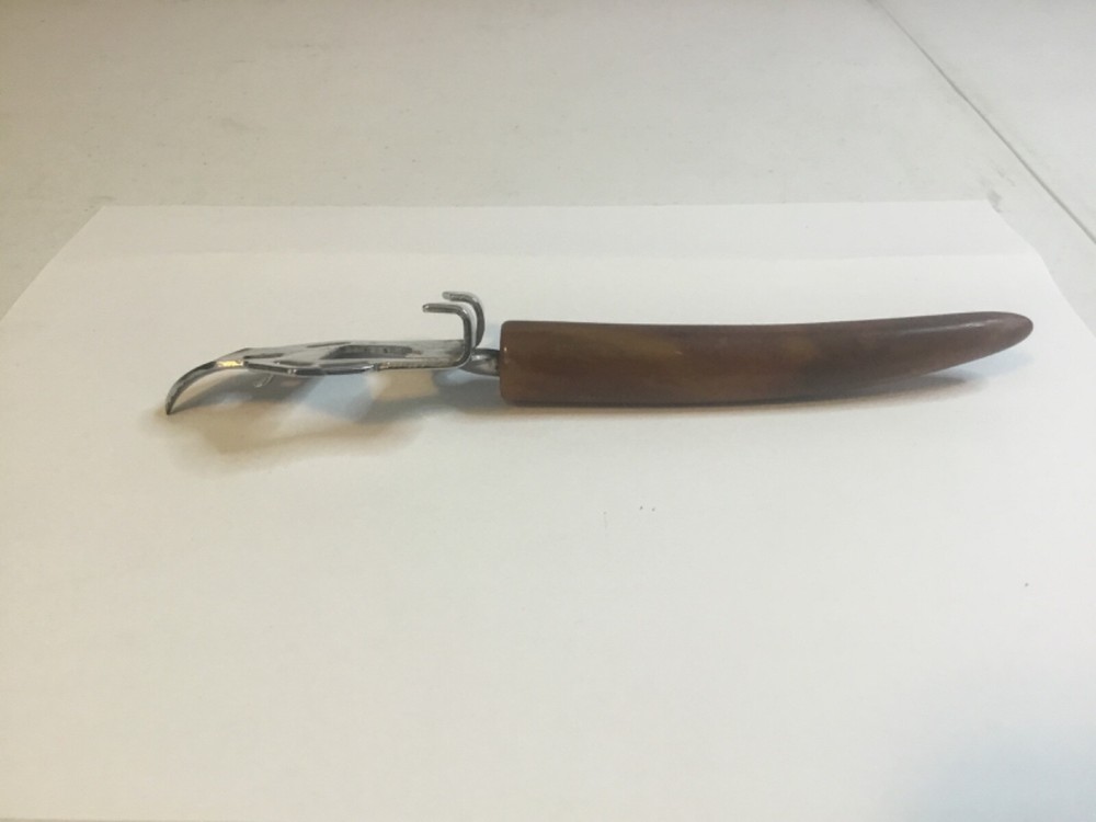 Vintage Bakelite Butterscotch Handle Can Opener