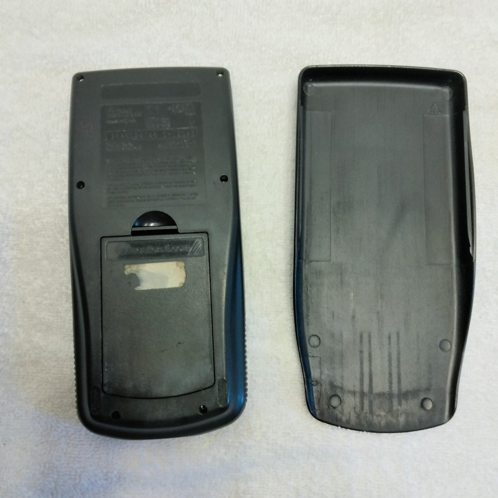 Texas Instruments TI-83 Plus Graphing Calculator - Black with sliding cover