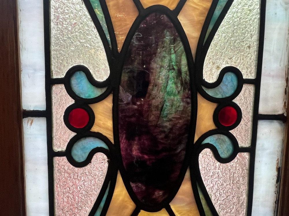 Interesting small stained glass window