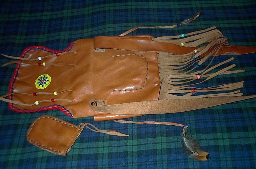 BLACK POWDER, MOUNTAIN MAN , BEAVER TAIL, ROSETTE, LEATHER POSSIBLE BAG